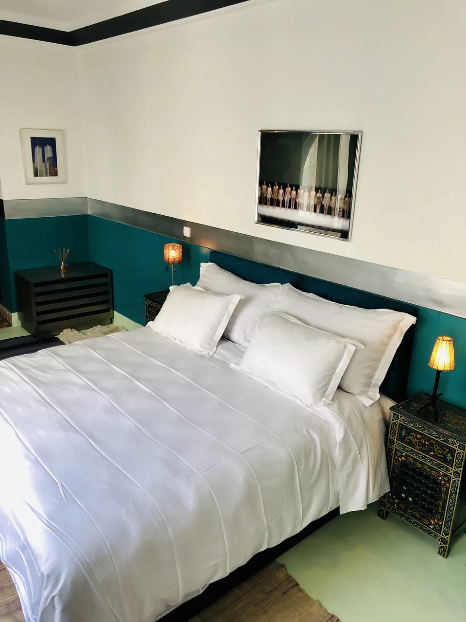 The Suite at Dar Maureen, teal accented bedroom with king-size bed